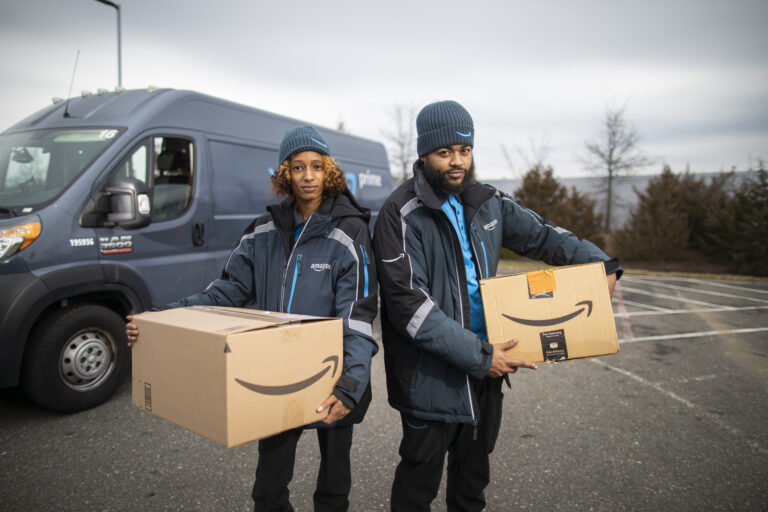amazon workers with packages