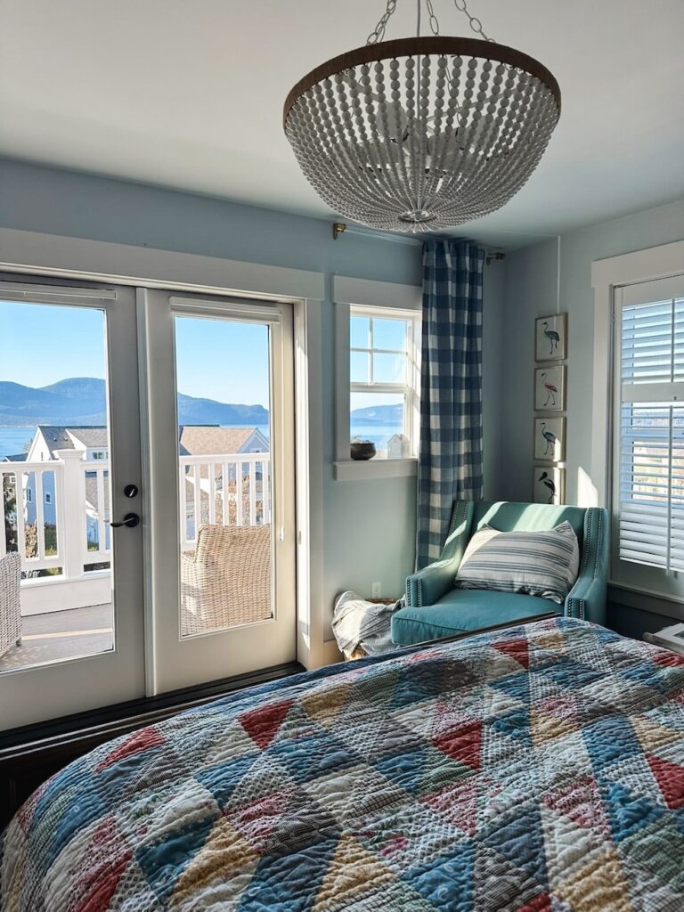 coastal cottage bedroom patchwork quilt beaded chandelier the inspired room