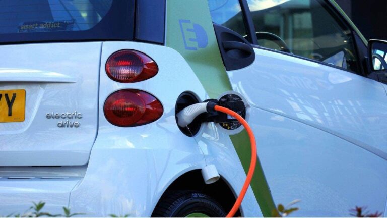 1 EV paradise or charging hell an electric car is plugged into a charging station