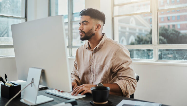 worker does work on computer