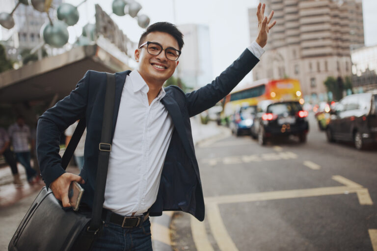 corporate worker hailing ride street uber