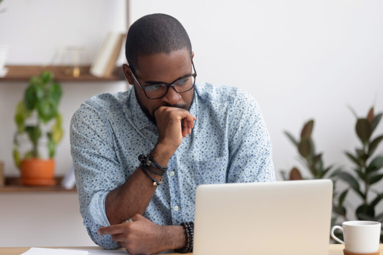 getty person feeling worried looking at a laptop 1200x800 5b2df79