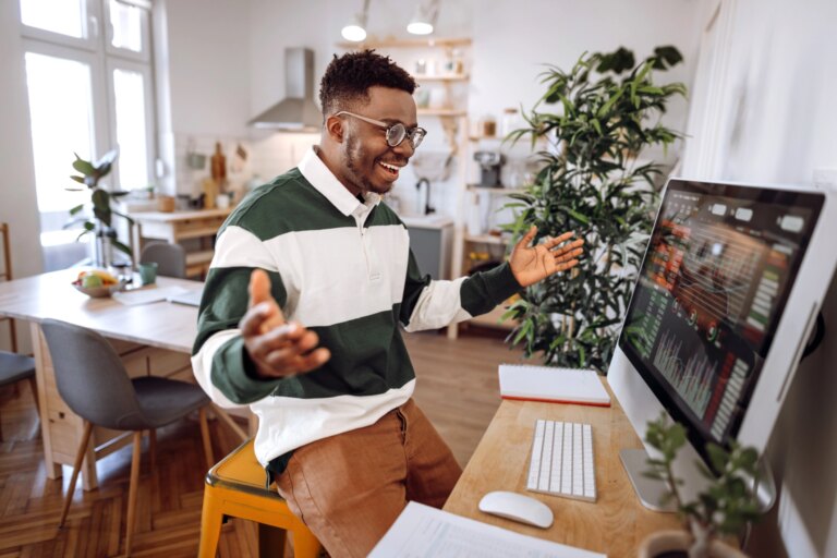 investor celebrating stock market success getty