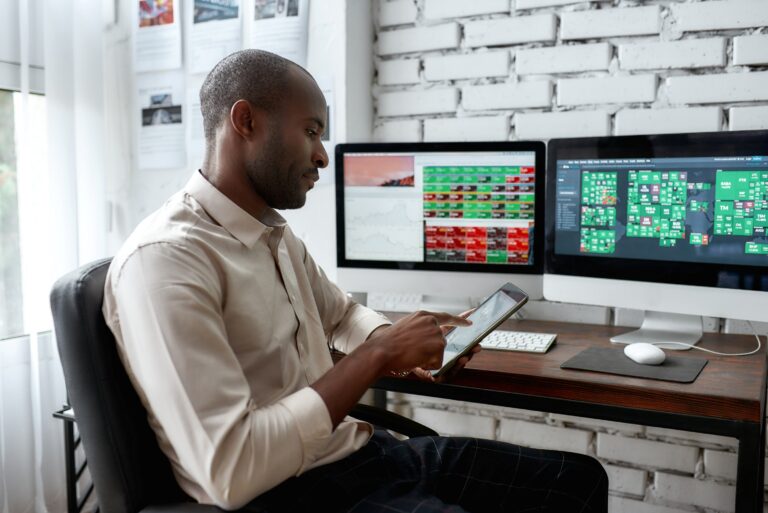 investor looking at stocks on a tablet