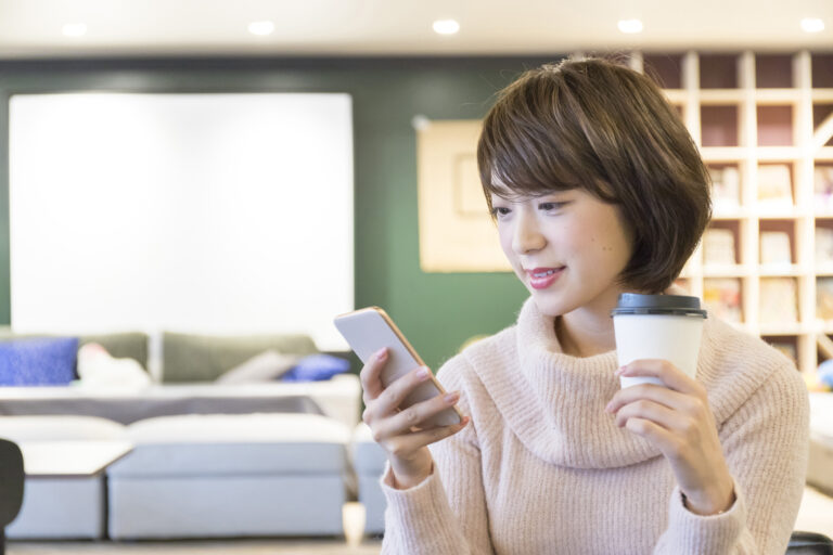 woman looking at smarphone
